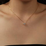 GALAXY CROSSHEART NECKLACE | GOLD